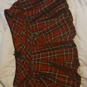 Pleated red and black plaid skirt